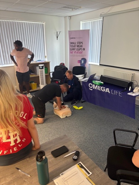 Omega Training session in progress with staff taking part